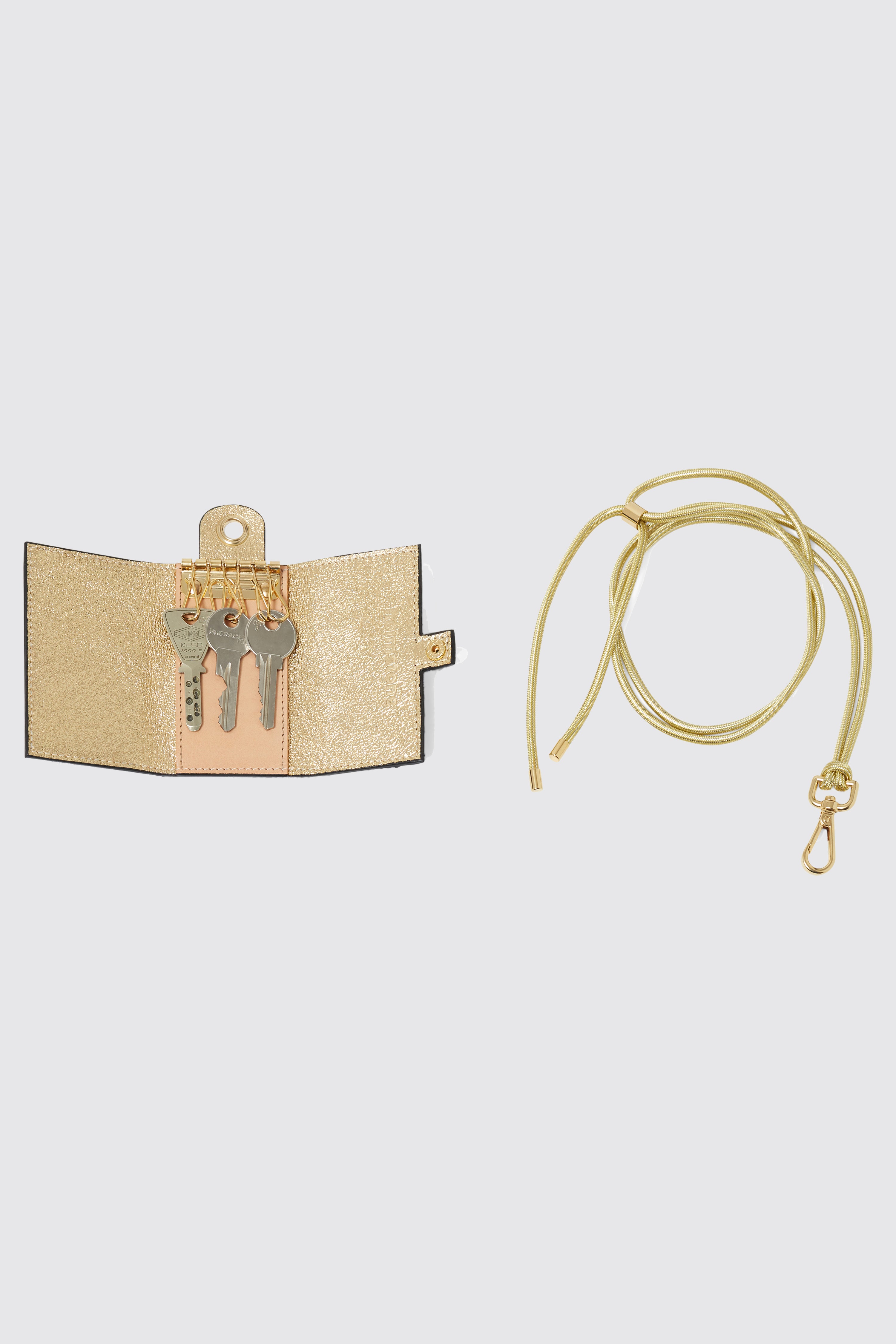 Les Minis - Porte-clé à clapet en cuir imprimé guépard bleu